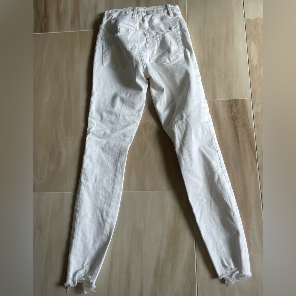 Good American white high waisted skinny jeans size 25 waist.